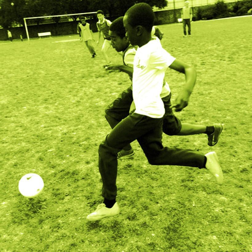 Children playing football
