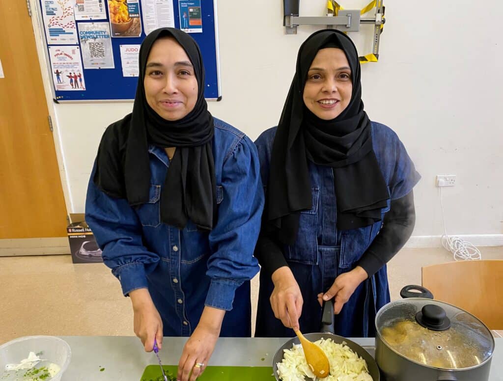 The founders of the Healthy Eating Cooking Club, held at Aberfeldy Centre in Tower Hamlets, are cooking a delicious, traditional Bengali dish.