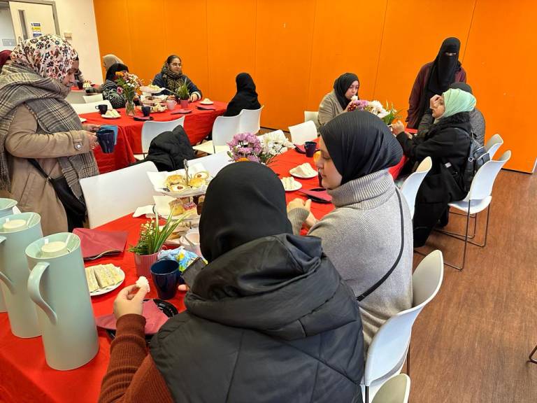 Residents enjoy high tea together at the Bernie Cameron Centre in Bow