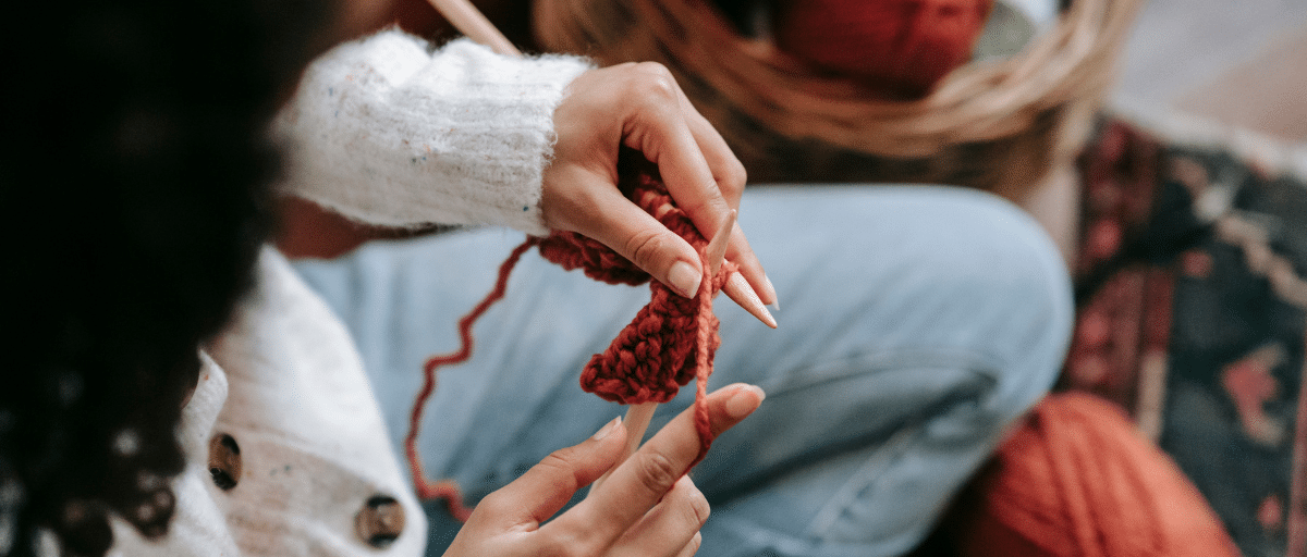 Close up of hands knitting