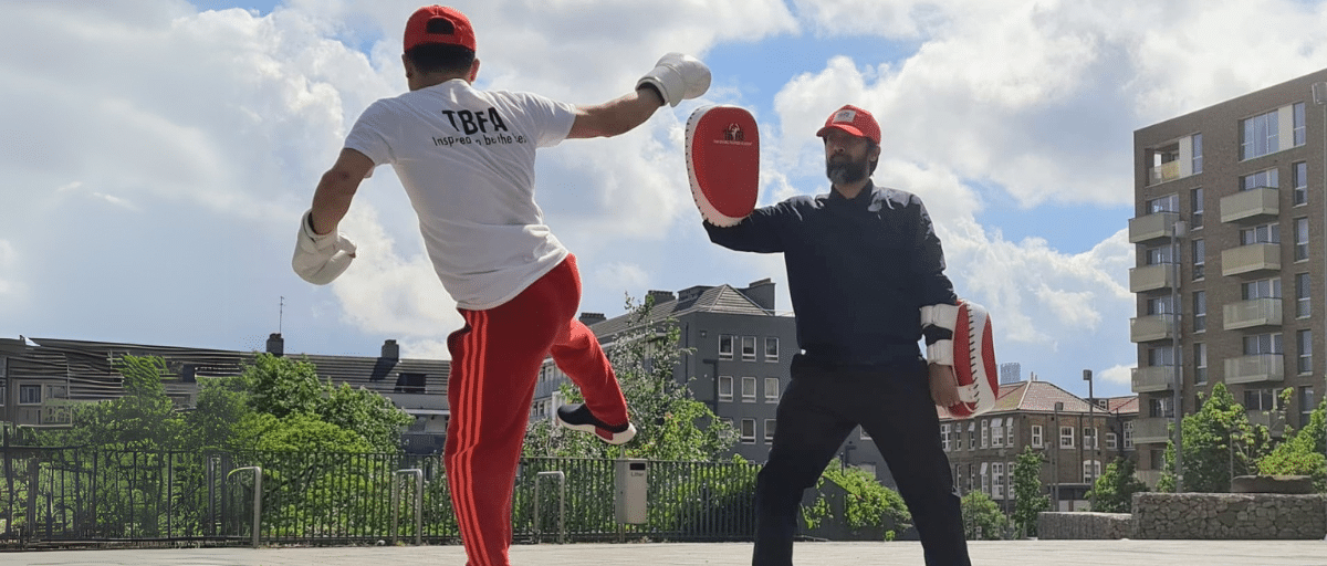 Instructors from Thai Boxing Fighters Academy demonstrate some Muay Thai kicks.