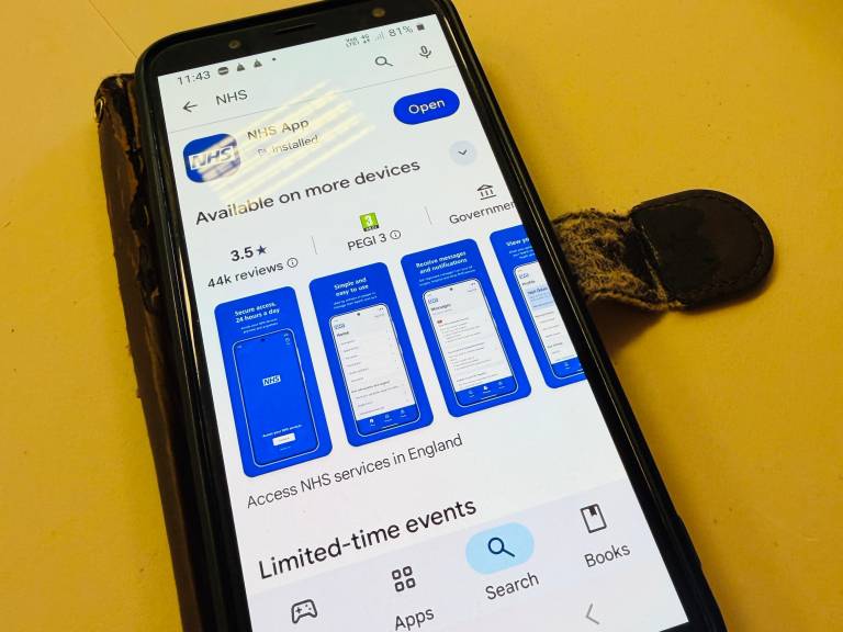 A screen showing somebody downloading the NHS App