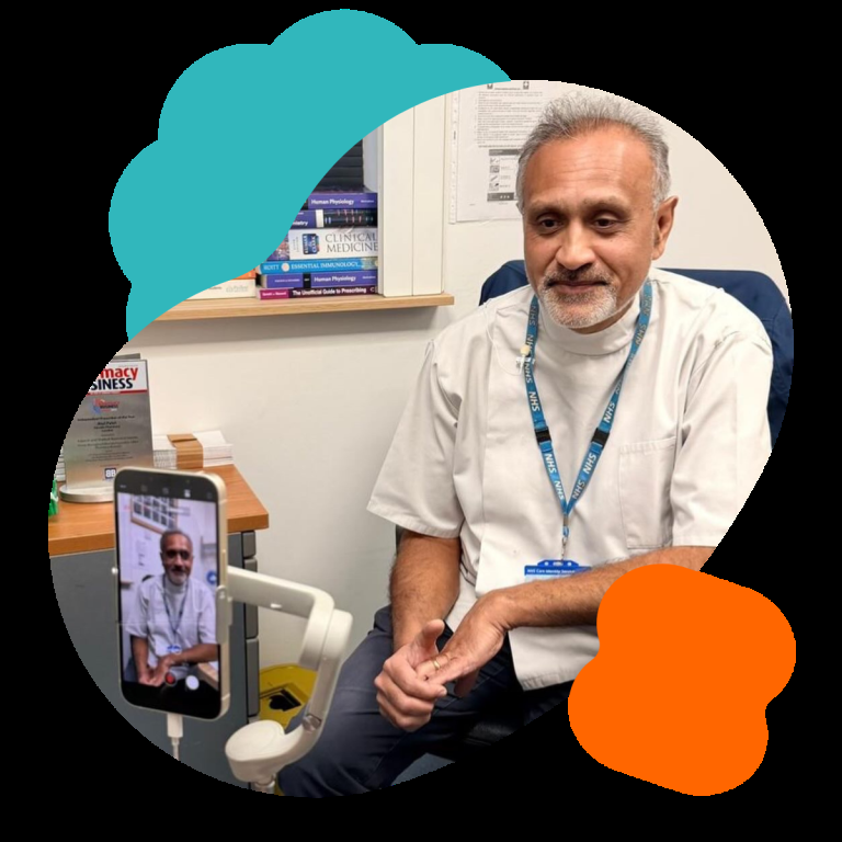 Lead pharmactist Atul from Lincoln Pharmacy is filmed answering residents questions about flu vaccinations as part of Well One's Winter MOT project