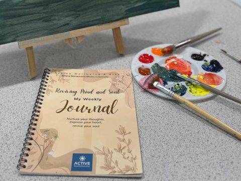 Some of the craft supplies and journal at an Active Wellbeing and Arts mindful arts session